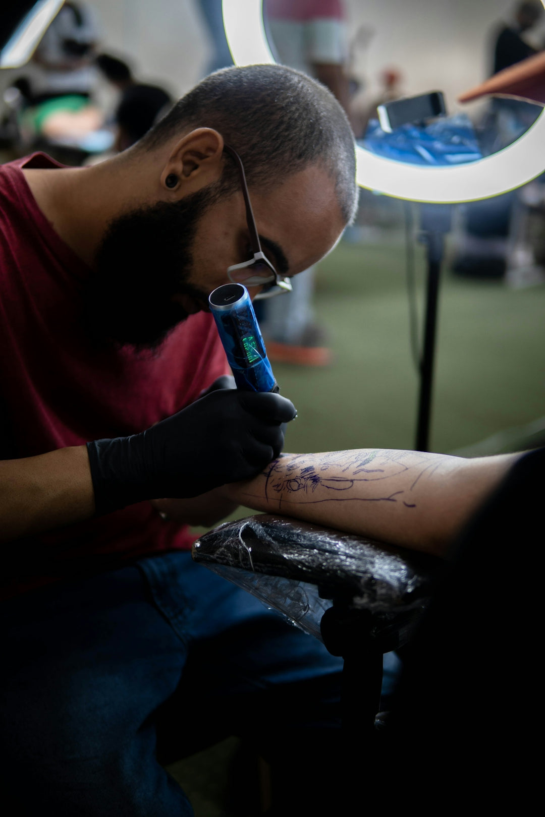 a man getting a tattoo